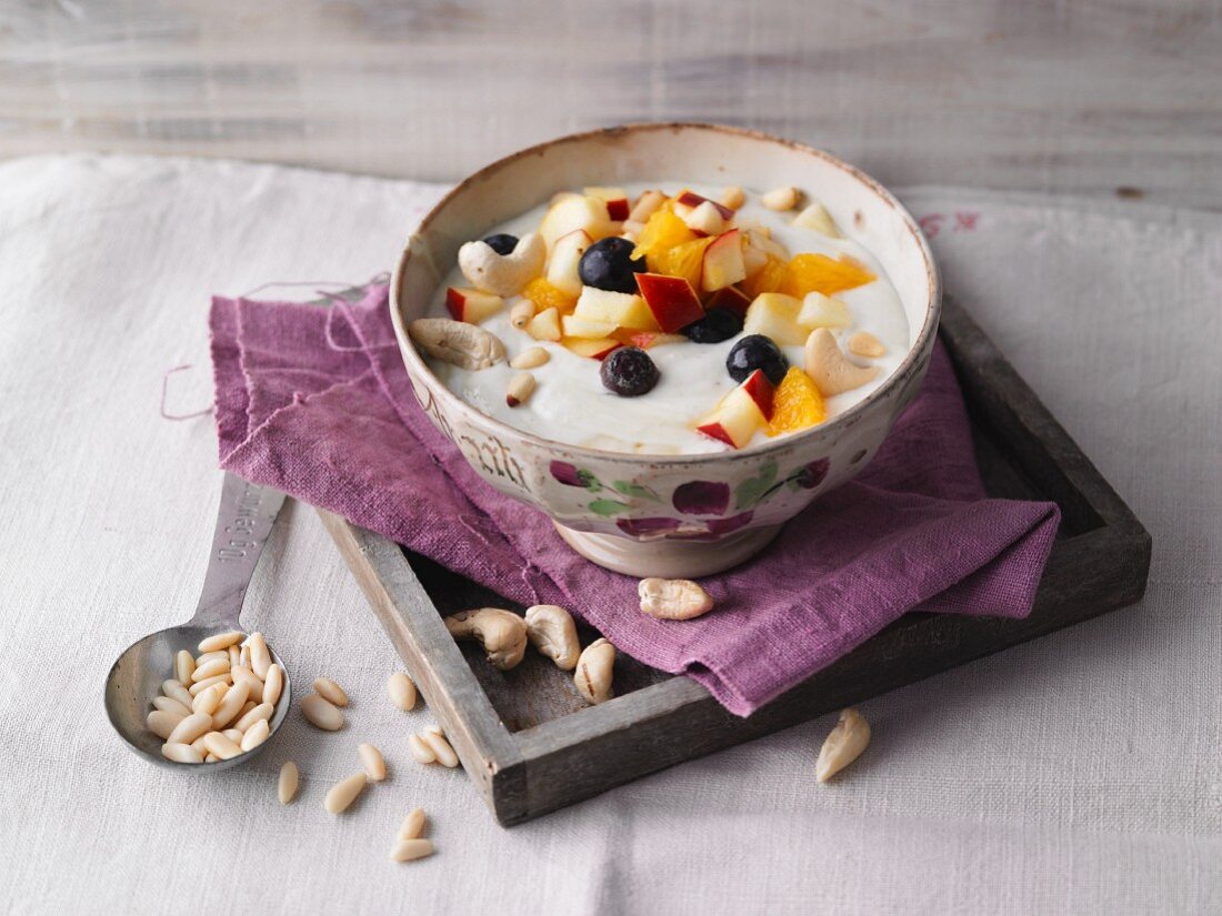 Almond and fruit yoghurt with pine nuts