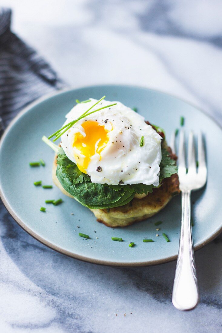 Spaghetti squash cakes and poached egg