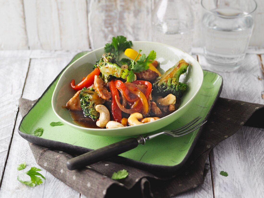 Asian-style wok vegetables with chicken breast and cashew nuts