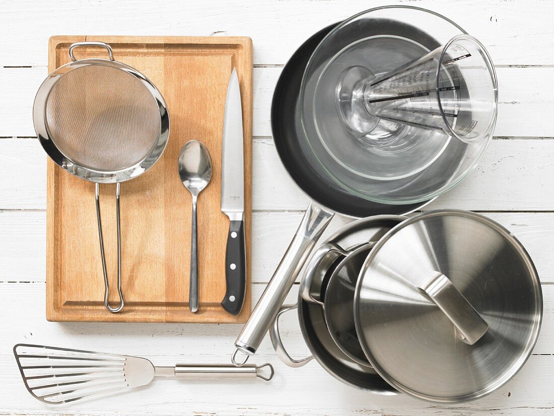 Kitchen utensils: Pots, pan, measuring cup, sieve, spatula