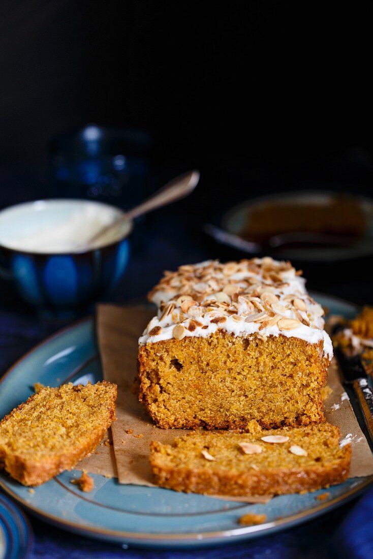 Carrot Cardamom Cake with Cream Cheese Frosting and toasted almonds