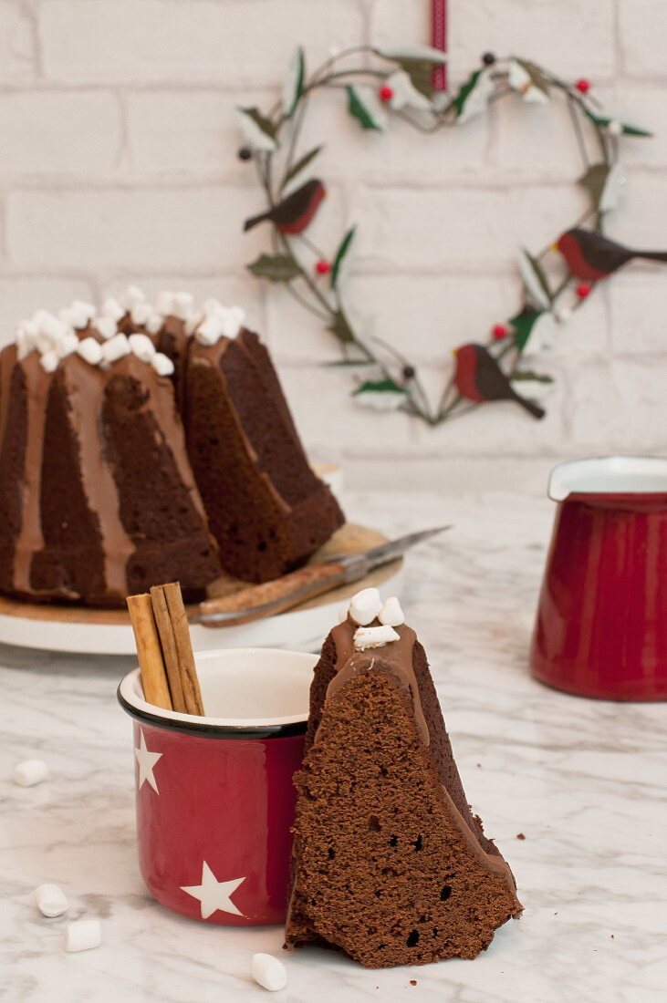 A Bundt cake and a cup of hot chocolate