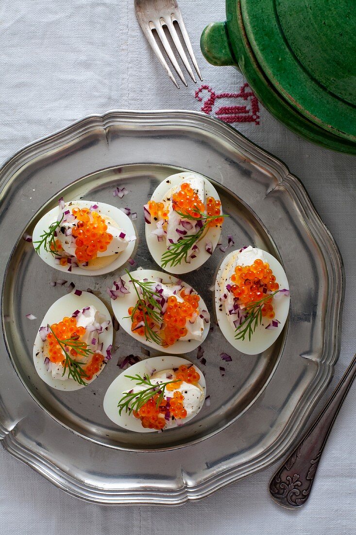 Eggs filled with salmon caviar