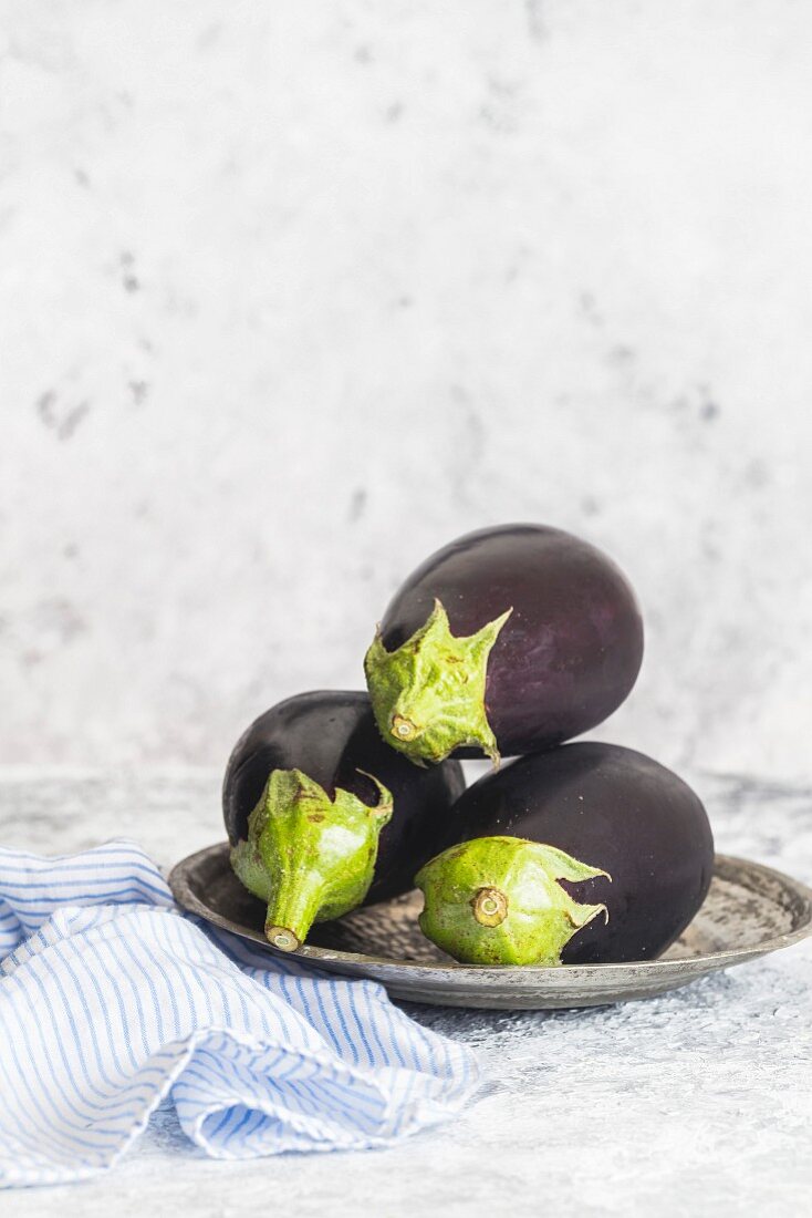 Aubergines, or eggplant, in a Metal Tray