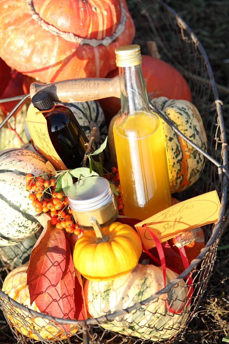 Pumpkin products in a basket with pumpkins
