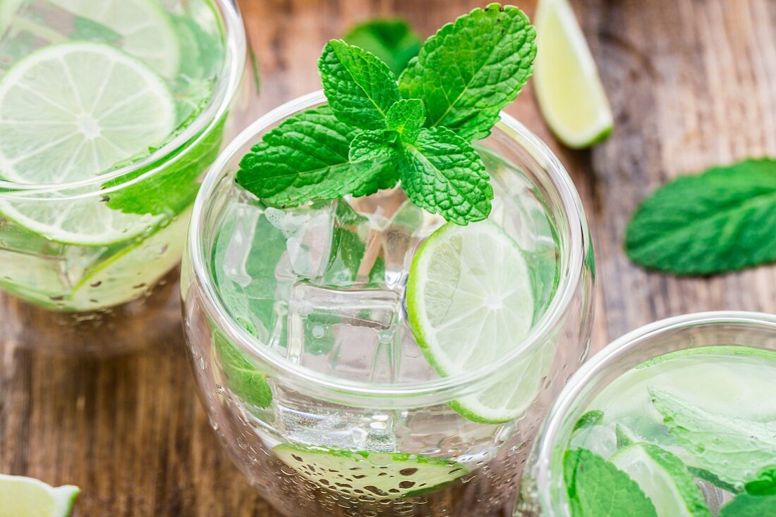 Ice cold cocktail with lime and mint