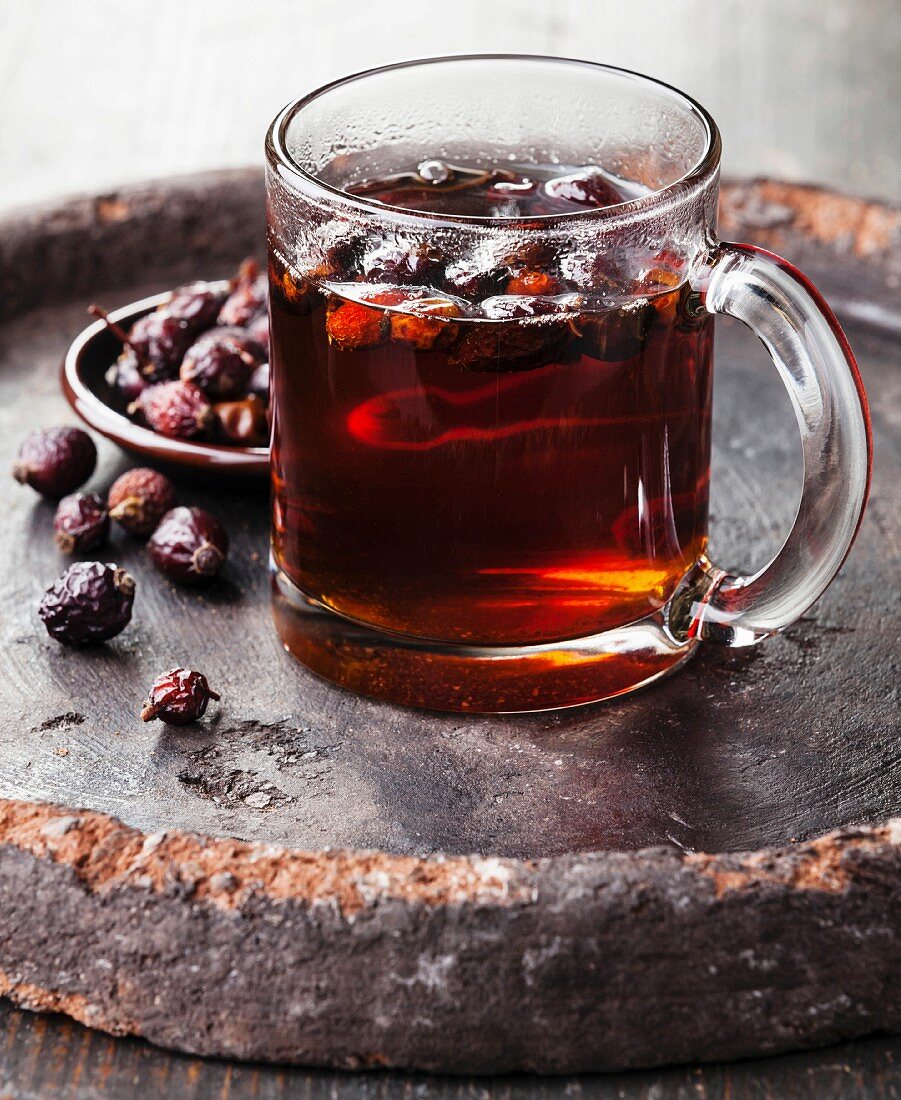 Rosehip tea on dark background