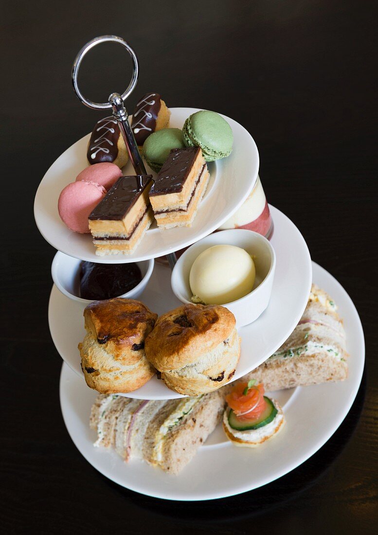 Afternoon tea with sandwiches and cakes