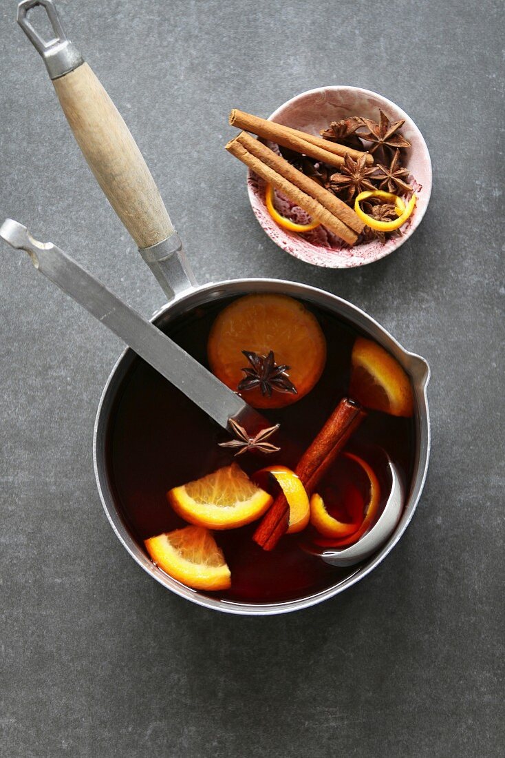 Infused wine with citrus, cinnamon, anise and brown sugar