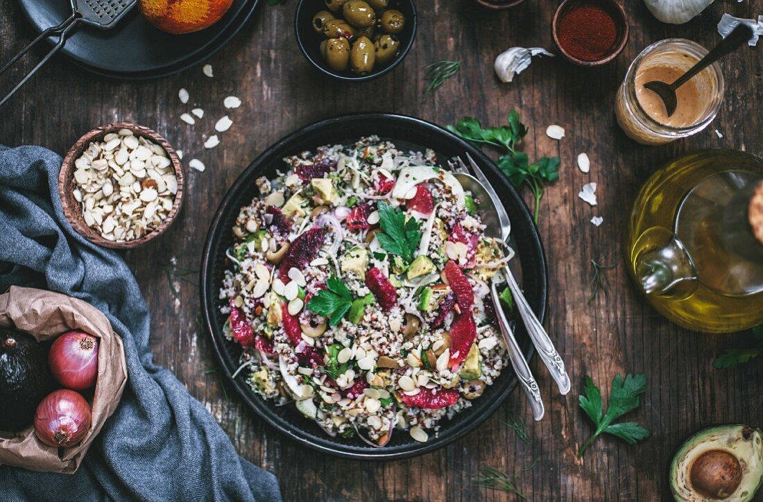 Avocado and Quinoa Salad with Blood Oranges and Fennel, served in a dark tin plate