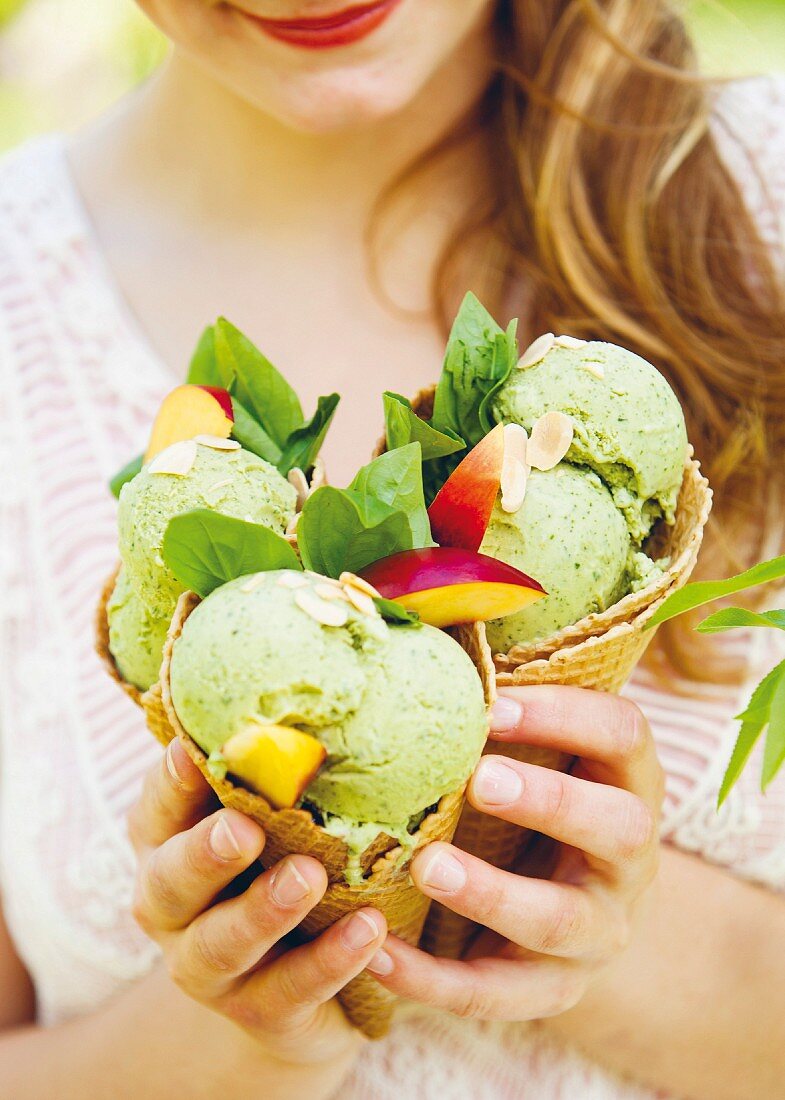 Basil ice cream with nectarines and almond flakes