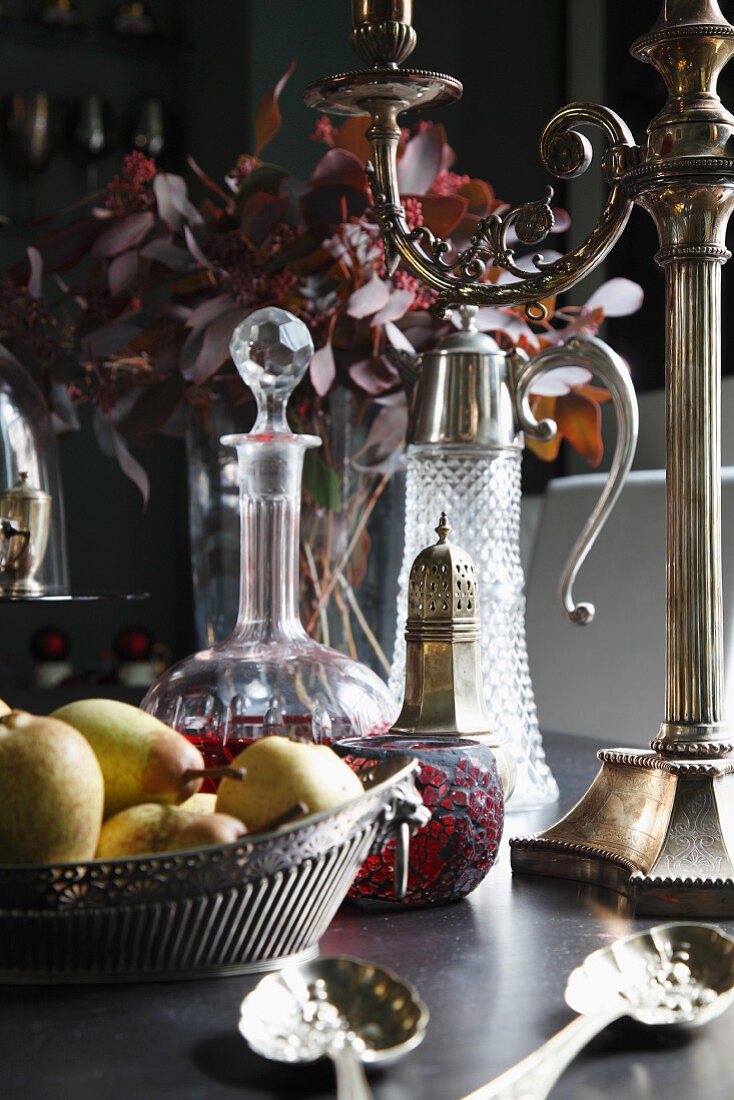 Detail of silver and glassware on the dining table