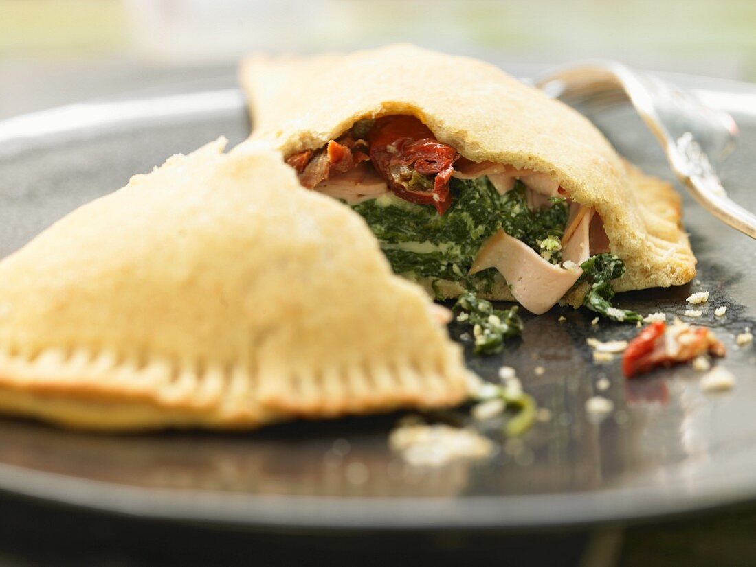Calzone with spinach and smoked mozzarella