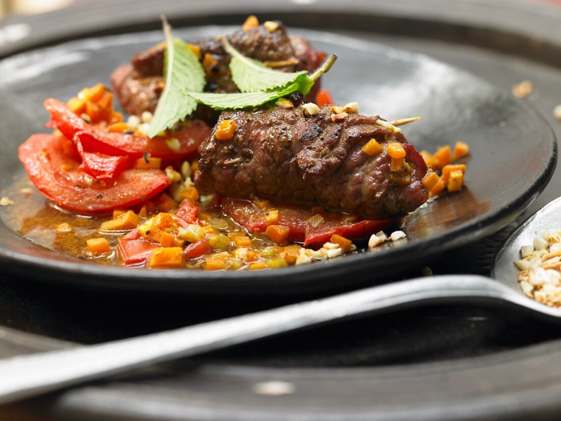 Beef roulade with figs and stewed vegetables