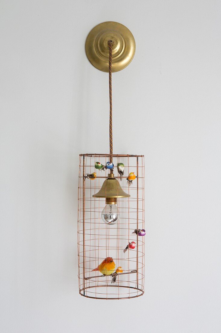 Wire lampshade decorated with bird ornaments