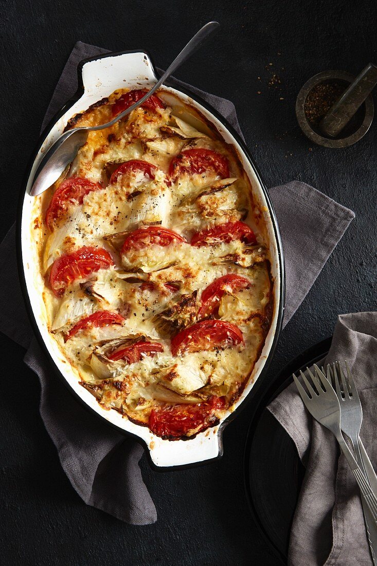 Chicory and tomato gratin with coconut and lime crust
