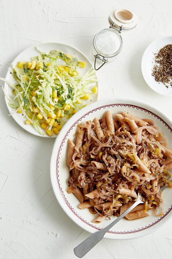 Wholemeal penne with leek, minced beef and onion ragout