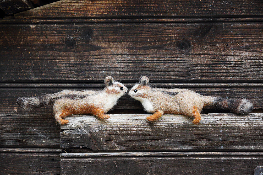 Two hand-made, felted, woollen animals