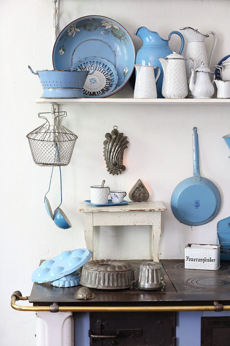 Old kitchen utensils made from blue and white enamel