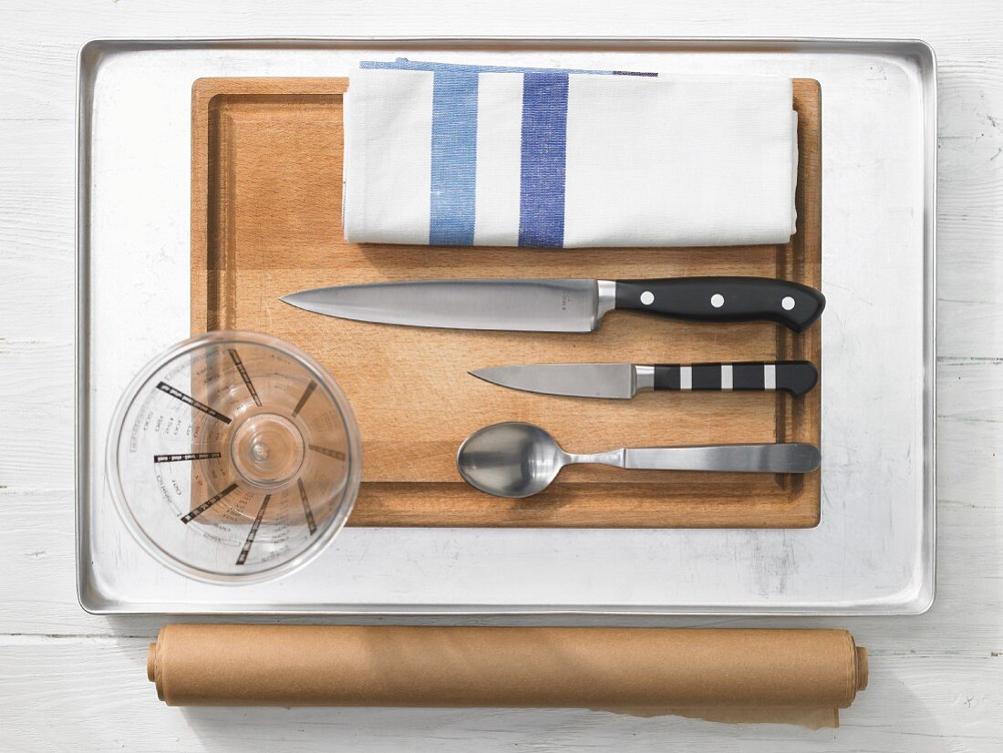 Kitchen utensils for preparing John Dory fish