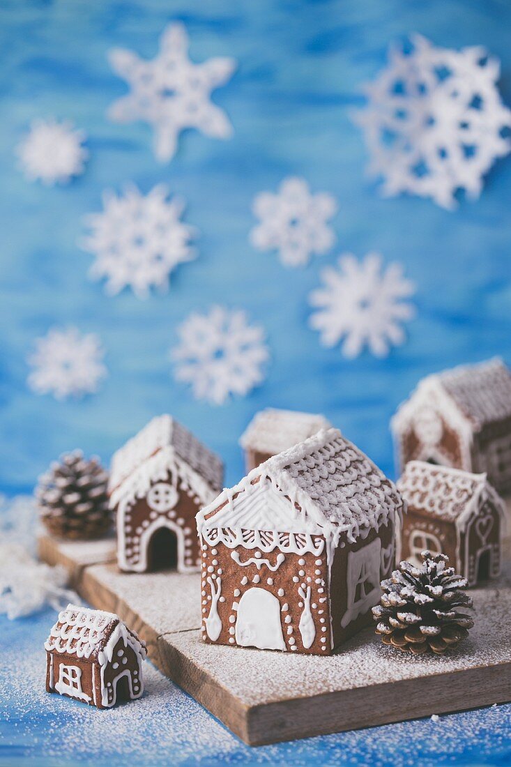 Gingerbread houses decorated with white royal icing