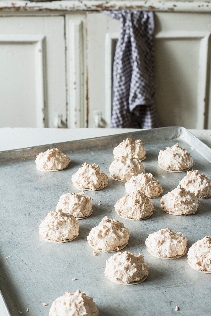 Coconut macaroons on a baking sheet