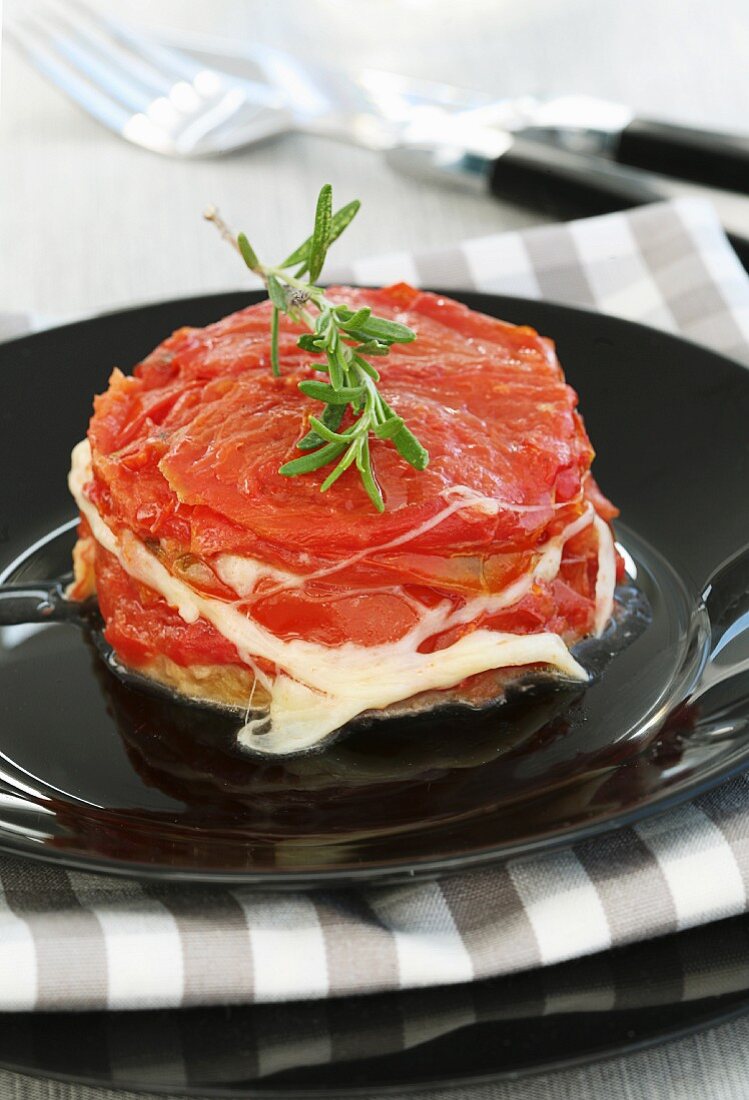 A layered tomato and mozzarella tartlet
