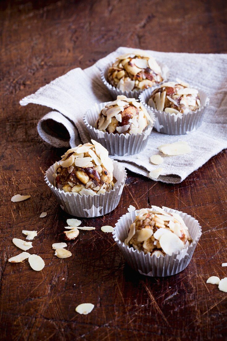 Date nut balls with almond flakes