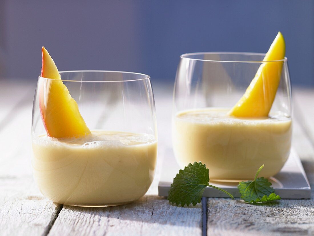 A mango and banana drink with orange juice and yoghurt