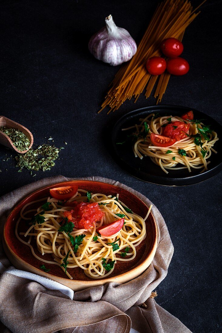 Spaguetti with tomato cheese and oregano, typical italian pasta