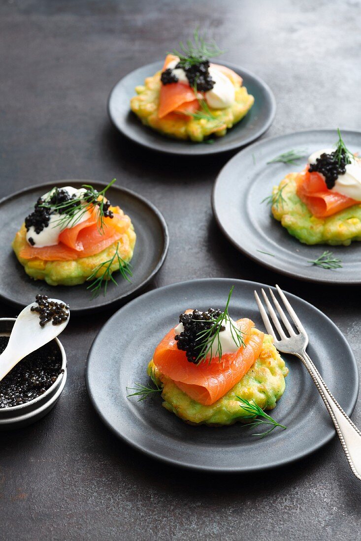Avocado and sweetcorn blinis with lime crème-fraiche, smoked salmon and caviar