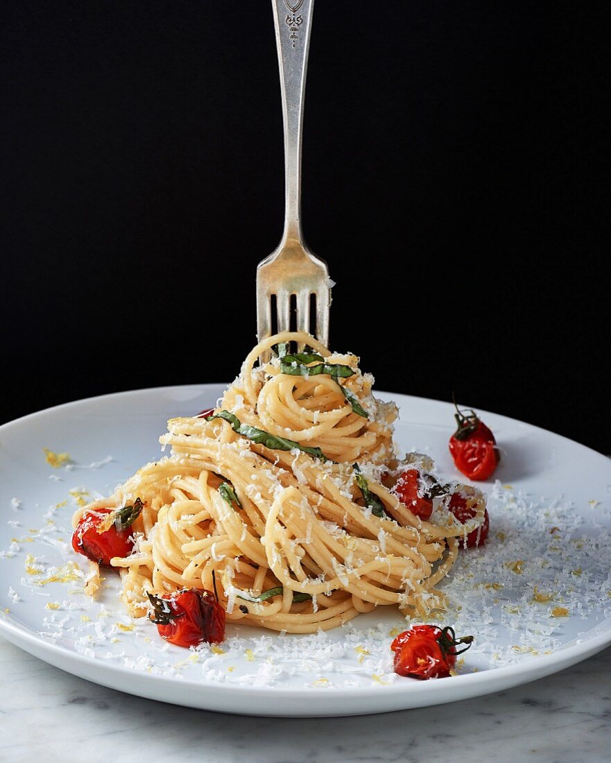 Spaghetti al limone with blistered cherry tomatoes