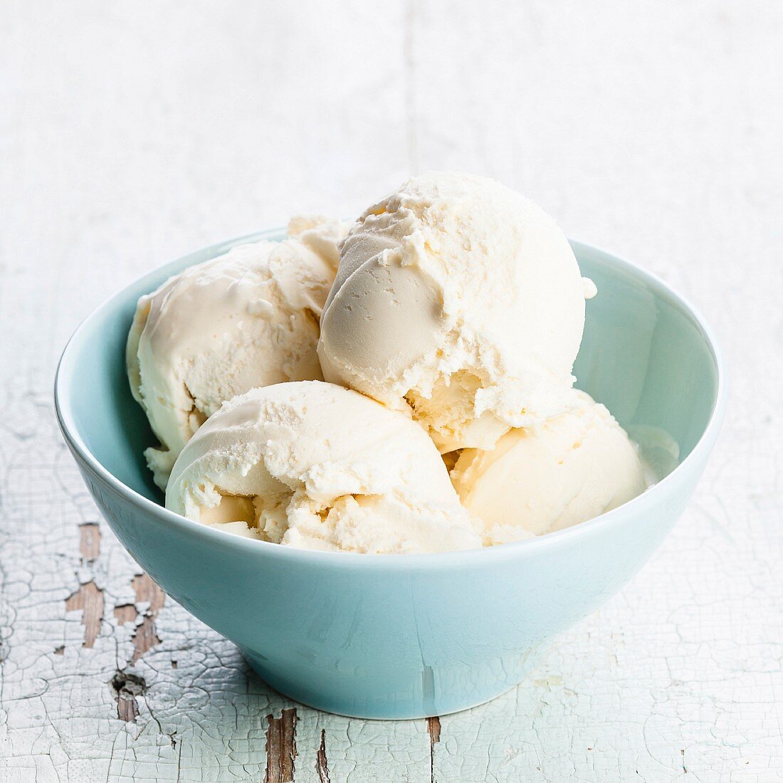 Vanilla ice cream in blue bowl