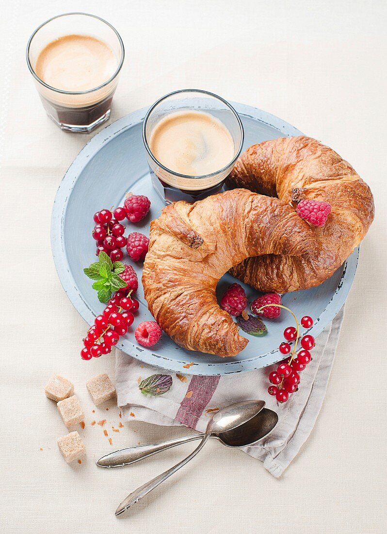 Breakfast with croissants and coffee