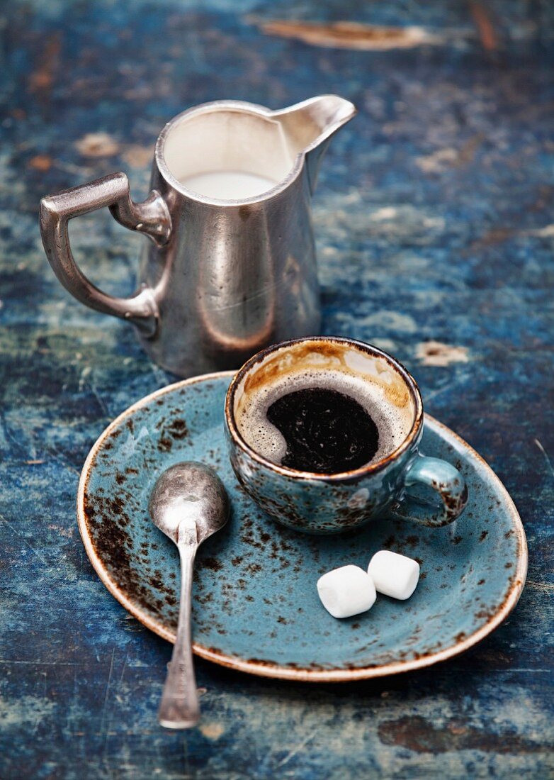 Coffee cup on blue background