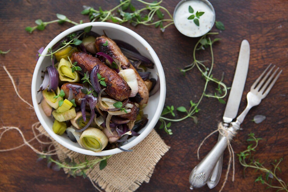 Sausage, Leek, Red Onion and Thyme in a bowl with Sour Cream
