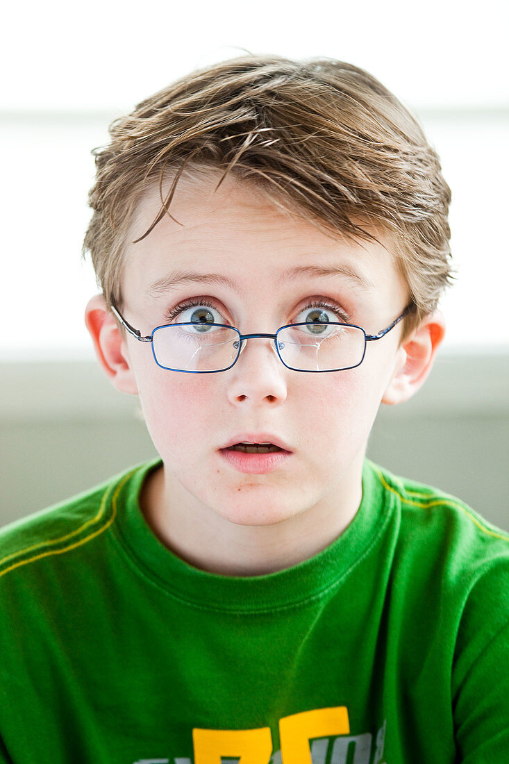 Child with broken glasses