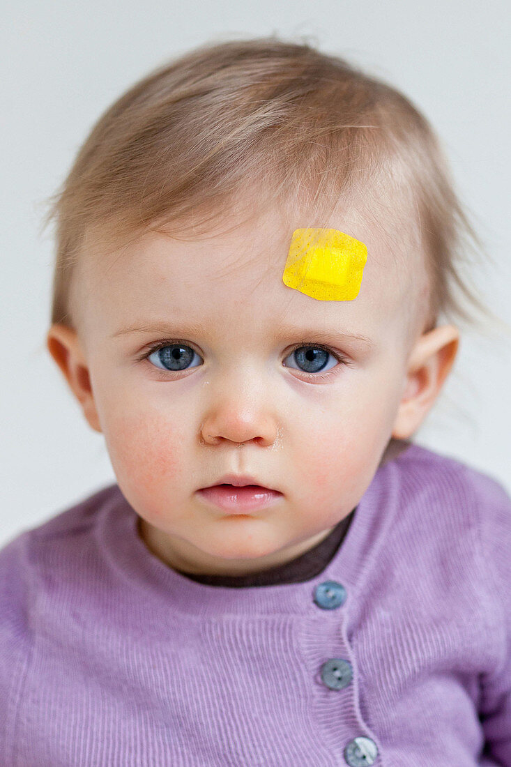 Baby with band-aid