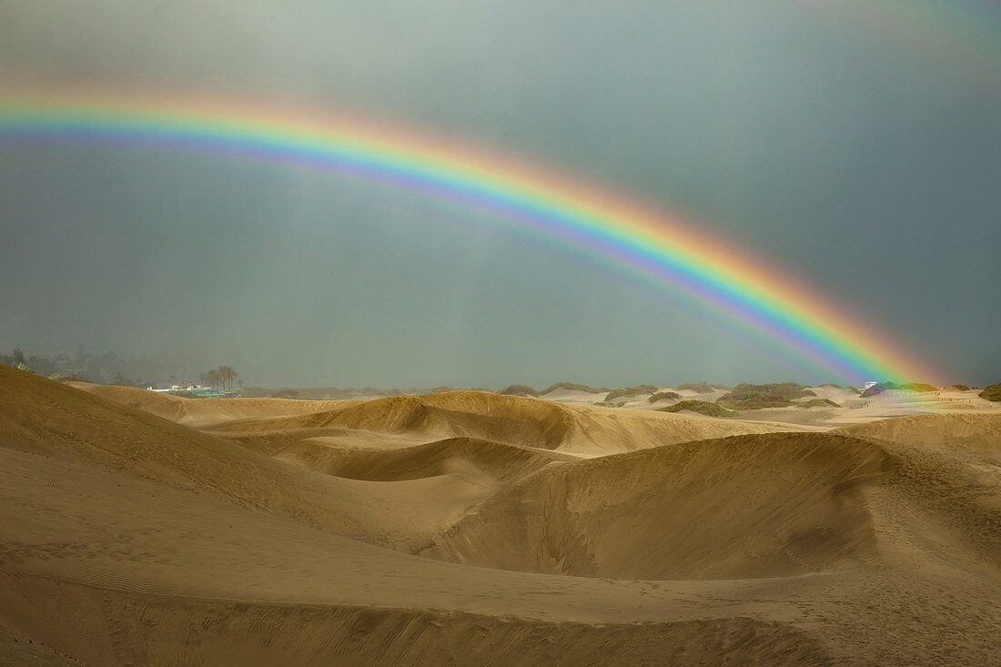 Rainbow over desert, Utah, USA