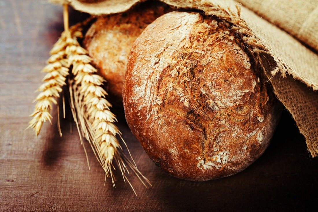 Freshly baked bread on wooden table