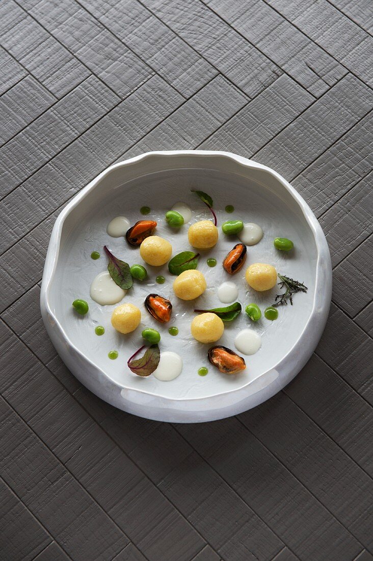 Gnocchi, mussels, broad beans and thyme from the 'D'O' restaurant in Milan, Italy
