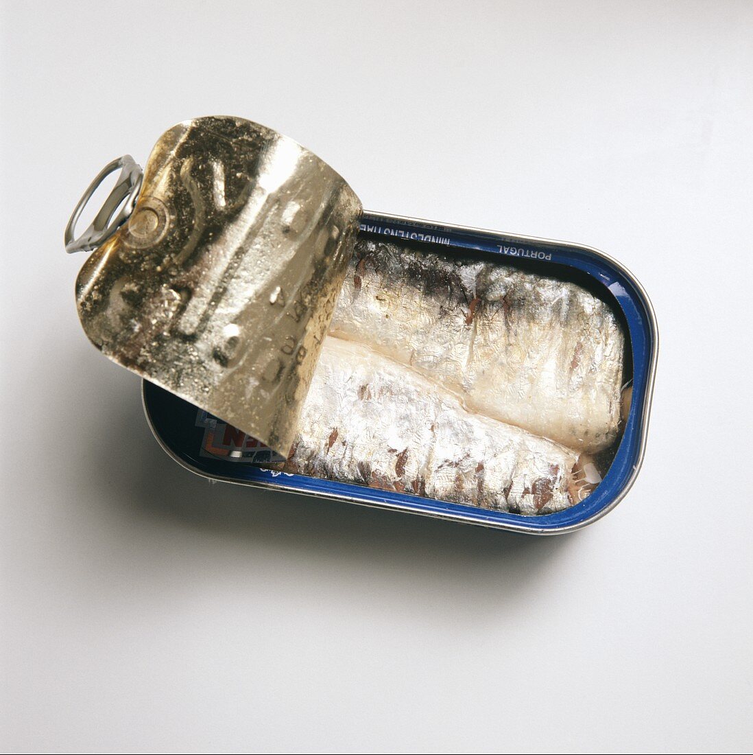 Sardines in a Partially Opened Can
