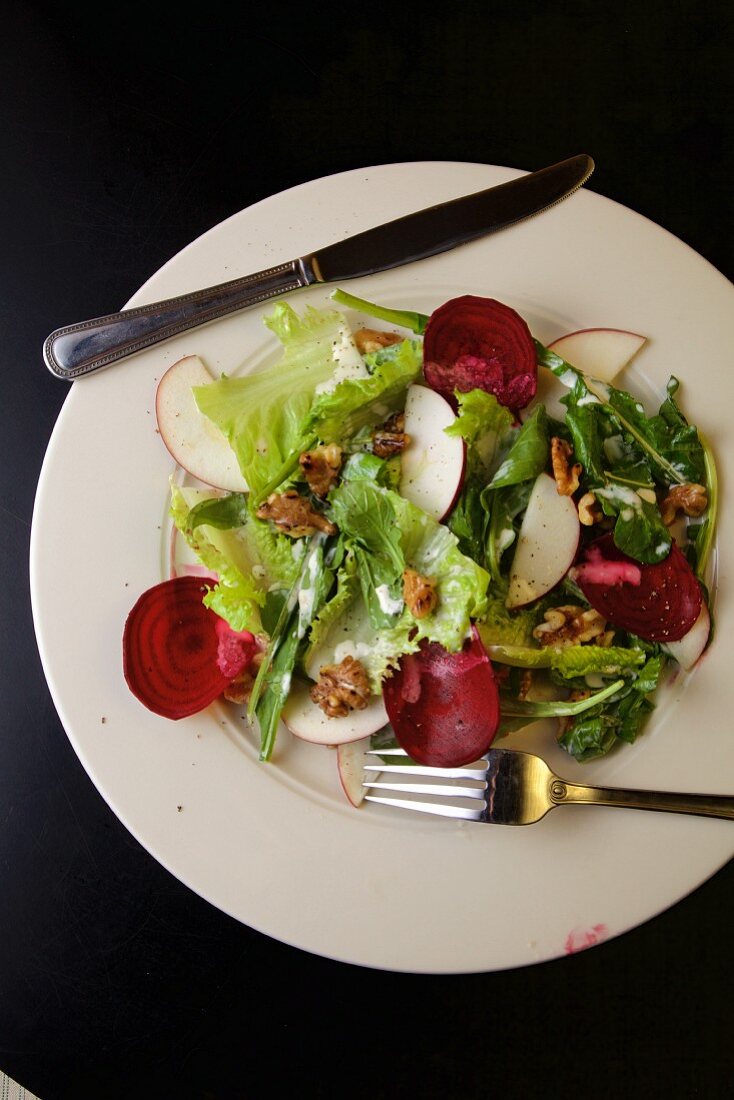 Apple, greens, red beet and walnut salad with buttermilk dressing