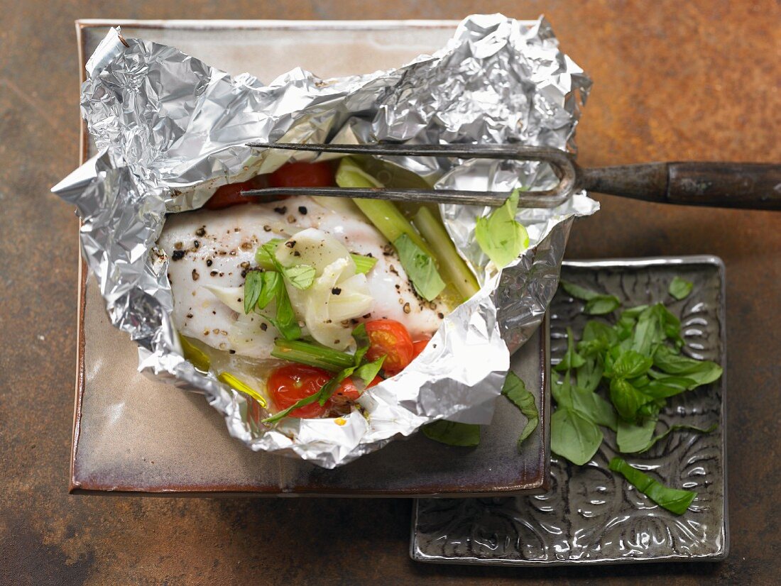 Chicken breast cooked in foil with fennel and celery