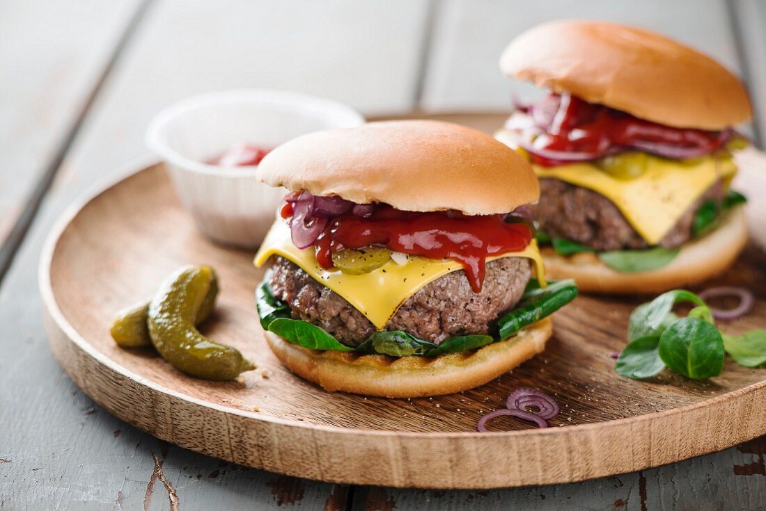 A beefburger with ketchup