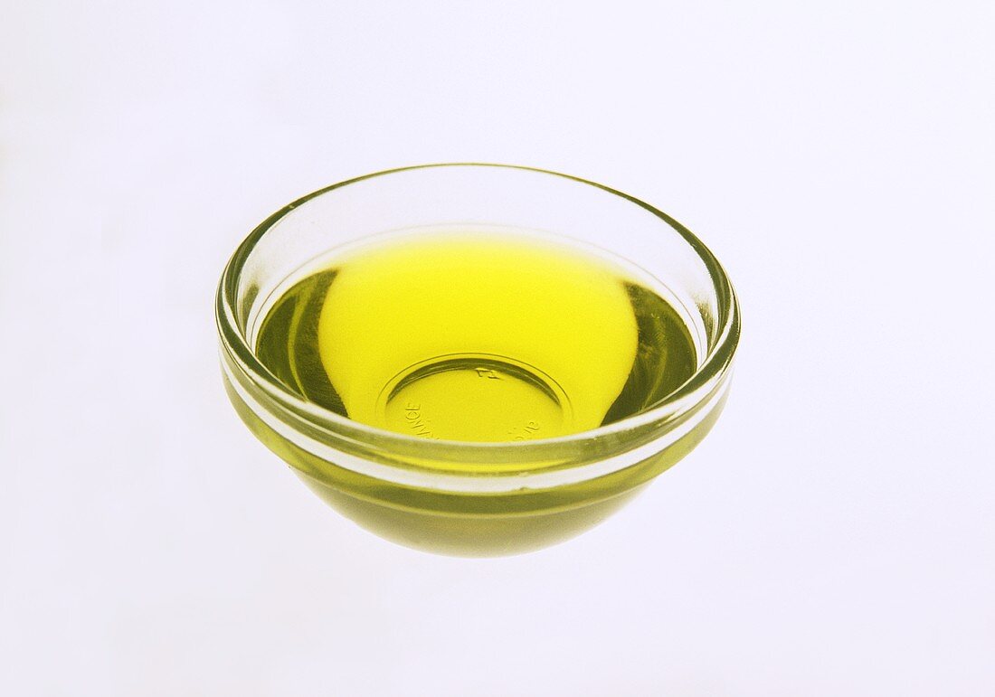 A glass bowl of olive oil