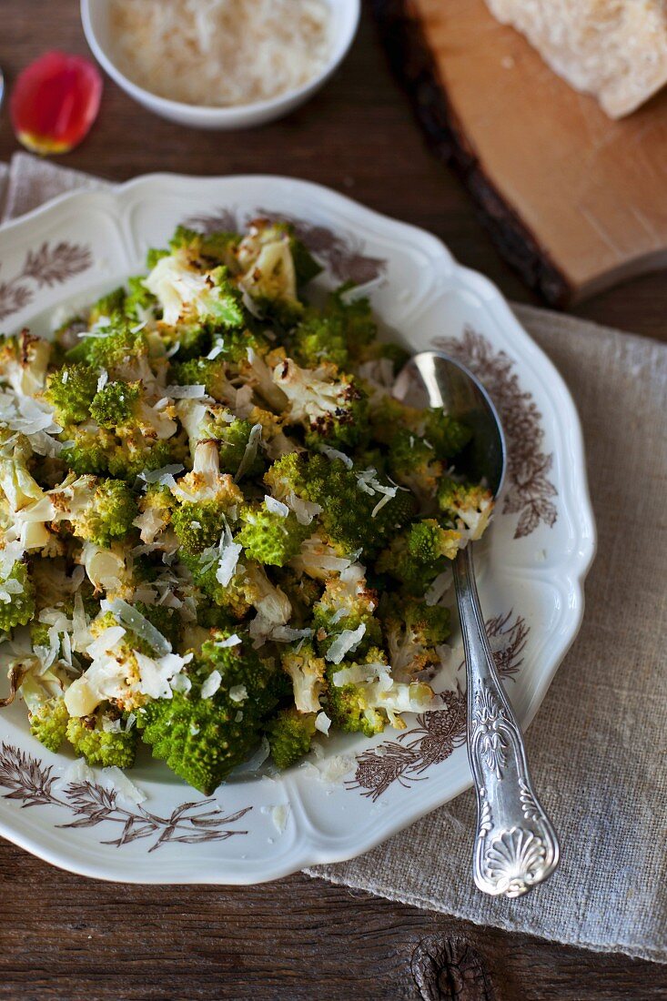 Roasted Romanesco broccoli with Parmesan cheese on a plate