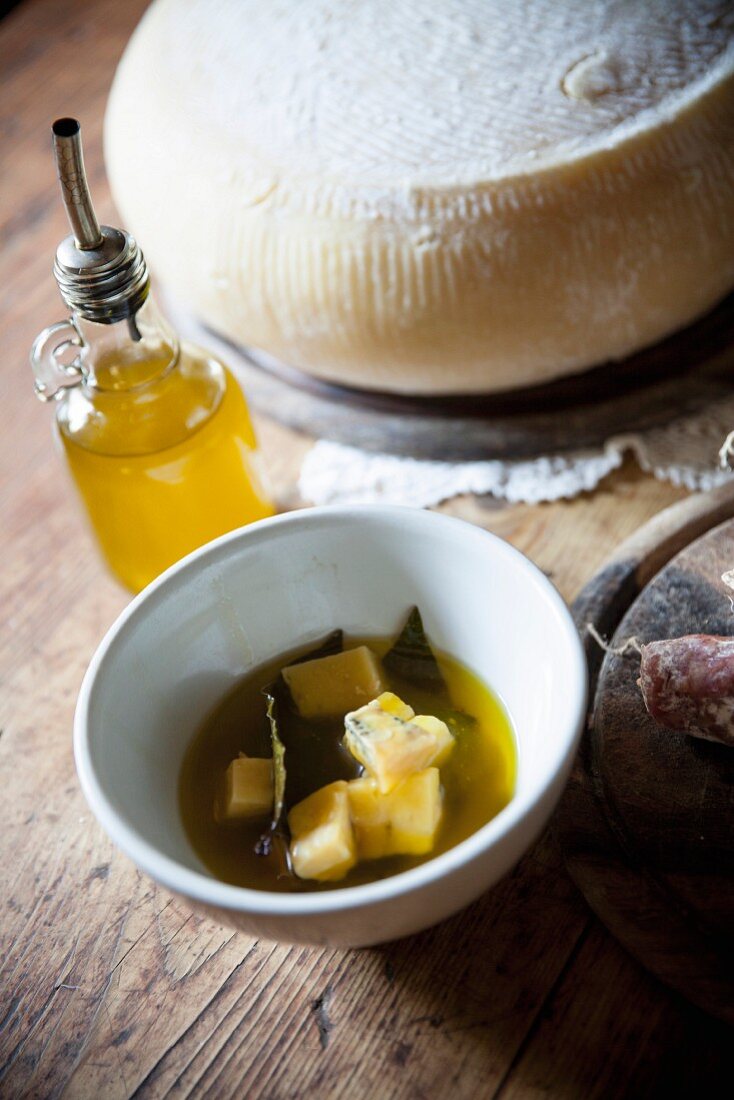 Cheese with olive oil in a bowl