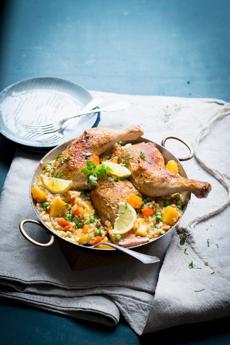 Paella with pumpkin and chicken