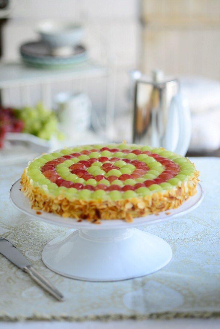 Grape cake on cake stand